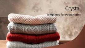  Presentation with stack - Slide set featuring cashmere - stack of warm winter clothes background and a soft green colored foreground