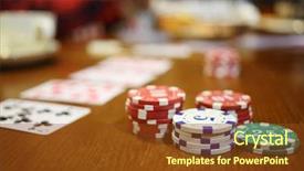  Presentation with playing cards - Slides featuring casino chips playing cards on table cup hands out of focus background and a tawny brown colored foreground