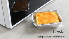 Presentation with baking - Audience pleasing PPT theme consisting of casserole in foil baking tin backdrop and a  colored foreground