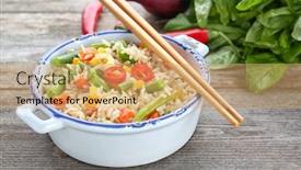  Presentation with brown rice - PPT layouts with casserole with brown rice and vegetables on table background and a yellow colored foreground