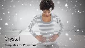  Presentation with falling snow - Audience pleasing presentation design consisting of casual woman with stomach pain sitting in bed against snow falling backdrop and a light gray colored foreground