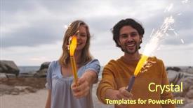  Presentation with cracker - Colorful presentation theme enhanced with caucasian couple playing with fire backdrop and a tawny brown colored foreground