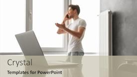  Presentation with cell - Slide deck having caucasian man in defocus talking on cell phone and using laptop on table while posing in home kitchen background and a mint green colored foreground