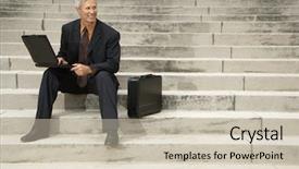  Presentation with steps - Audience pleasing theme consisting of caucasian middle aged businessman sitting on steps outdoors with laptop and briefcase backdrop and a soft green colored foreground