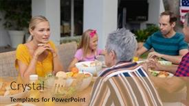  Presentation with family talking - Beautiful presentation design featuring caucasian-woman-sitting-at-table backdrop and a coral colored foreground