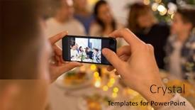  Presentation with dinner party - Cool new slides with celebration holidays and people concept - man with smartphone taking picture of family at dinner party backdrop and a gold colored foreground