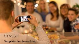  Presentation with dinner party - Presentation design featuring celebration holidays and people concept - man with smartphone taking picture of family at dinner party background and a coral colored foreground