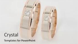  Presentation with gold glitter wedding anniversary - PPT theme consisting of celebratory accessories - two gold rings background and a soft green colored foreground