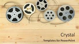  Presentation with obsolete - Amazing presentation theme having celluloid - obsolete cinema films on wooden backdrop and a lemonade colored foreground