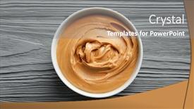  Presentation with peanut butter - Colorful theme enhanced with ceramic bowl with creamy peanut butter on wooden background backdrop and a gray colored foreground