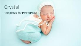  Presentation with newborn - PPT theme having charming-newborn-in-knitted-suit background and a sky blue colored foreground
