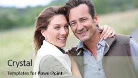  Presentation with old couple walking - Audience pleasing slide deck consisting of cheerful 40-year-old couple walking in countryside backdrop and a soft green colored foreground