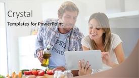 Presentation with dinner - PPT theme having cheerful couple in kitchen cooking dinner using tablet background and a white colored foreground