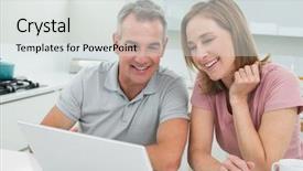  Presentation with kitchen - Audience pleasing PPT theme consisting of cheerful couple using laptop in the kitchen at home backdrop and a light gray colored foreground
