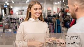  Presentation with credit card - Audience pleasing presentation design consisting of cheerful girl looking at her boyfriend with smile while taking his credit card to pay for what she bought on sale in the mall backdrop and a coral colored foreground