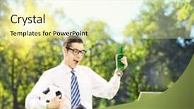  Presentation with lens - Cool new theme with cheerful man seated on a green grass watching football on a laptop in a park shot with a tilt and shift lens backdrop and a soft green colored foreground