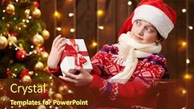  Presentation with christmas girl - Cool new slide deck with cheerful santa helper girl with gift box sitting indoor near decorated xmas tree with lights dressed in red sweater - merry christmas and happy holidays backdrop and a tawny brown colored foreground