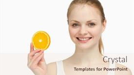  Presentation with orange slice - Amazing PPT theme having cheerful woman presenting an orange slice against white background backdrop and a lemonade colored foreground