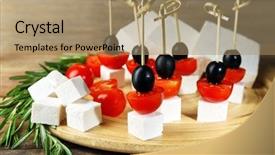  Presentation with cherry - Presentation consisting of ches - cheese canapes with cherry tomatoes background and a coral colored foreground