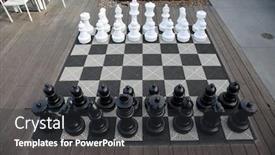  Presentation with play area - PPT layouts featuring chess-kit-giant-chess-game background and a dark gray colored foreground