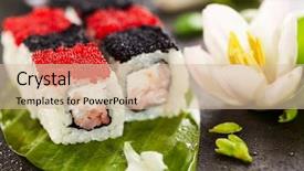  Presentation with prawn - Beautiful theme featuring chess maki sushi - roll with prawn and feta cheese inside topped with black and red tobiko flying fish roe served on banana leaf with flowers backdrop and a soft green colored foreground