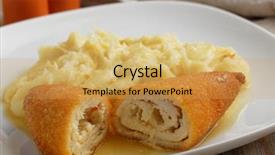  Presentation with potato - Audience pleasing theme consisting of chicken kiev with mashed potato on a rustic table backdrop and a yellow colored foreground