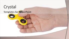  Presentation with bearing - Slides with child bearing - spinner in hand isolated background and a lemonade colored foreground