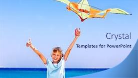  Presentation with kite - PPT theme consisting of child flying kite beach outdoor background and a sky blue colored foreground