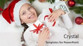  Presentation with emotions - Presentation design having child girl having fun with christmas decoration face expression and happy emotions dressed in santa hat lie on white fur background winter holiday concept background and a lemonade colored foreground