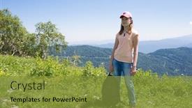  Presentation with green mountains - Audience pleasing presentation theme consisting of child girl in mountains on green grass under blue sky backdrop and a gold colored foreground