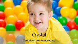  Presentation with children child kid joy faith - Audience pleasing PPT layouts consisting of child playing colorful ball backdrop and a yellow colored foreground