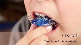  Presentation with orthodontic - Presentation enhanced with maloclusion - child with orthodontic appliance boy background and a coral colored foreground