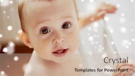  Presentation with emotions - Cool new presentation theme with childhood babyhood emotions and people concept - face of happy little baby boy or girl holding to table over snow backdrop and a soft green colored foreground