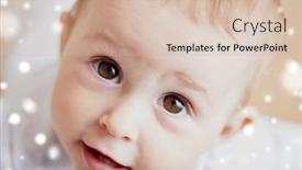  Presentation with emotions - PPT theme consisting of childhood babyhood emotions and people concept - close up of happy little baby boy or girl over snow background and a soft green colored foreground