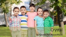  Presentation with childhood - Cool new theme with childhood fashion friendship and people concept - group of happy smiling little children hugging over summer campus background backdrop and a yellow colored foreground