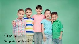  Presentation with friendship school - Beautiful slides featuring childhood preschool education friendship and people concept - group of happy smiling little children hugging over green school chalk board background backdrop and a seafoam green colored foreground