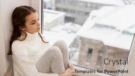 Presentation with sadness - Amazing PPT layouts having childhood sadness and people concept - sad beautiful girl in sweater sitting on sill at home window in winter backdrop and a mint green colored foreground