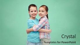 Presentation with friendship school - Cool new PPT theme with childhood school education friendship and people concept - happy smiling little girls hugging over green chalk board background backdrop and a mint green colored foreground