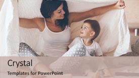  Presentation with young children playing - PPT layouts having children - young mother with her 2 background and a mint green colored foreground