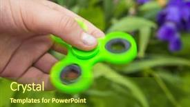  Presentation with green - Presentation design consisting of children adhd - rotating green spinner in hand background and a  colored foreground