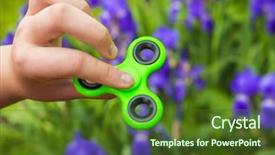  Presentation with green - Audience pleasing slide deck consisting of children adhd - rotating green spinner in hand backdrop and a  colored foreground