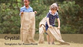  Presentation with diverse group of children reading - Beautiful PPT theme featuring children at a sack race backdrop and a coral colored foreground
