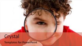  Presentation with looking glass - Presentation featuring children eyes - boy looking through magnifying glass background and a red colored foreground