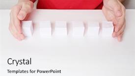  Presentation with children hands - Colorful slides enhanced with children hands and row of six small paper cubes on white table backdrop and a white colored foreground