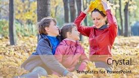  Presentation with maple leaves - Beautiful presentation featuring children look at their mother who sits next and tries on crown made of yellow maple leaves backdrop and a coral colored foreground