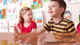  Presentation with children painting - Amazing PPT theme having children painting in art class backdrop and a red colored foreground