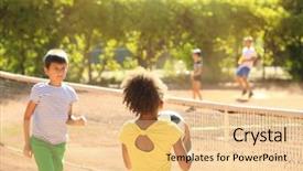  Presentation with sports children - Cool new slide deck with children playing on sports ground backdrop and a lemonade colored foreground