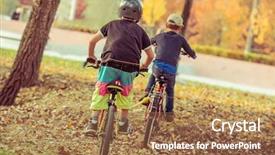 Presentation with bicycles - Beautiful slides featuring two little boys riding bicycles in the park backdrop and a coral colored foreground