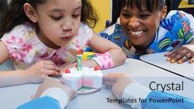  Presentation with mini birthday cake celebration - Audience pleasing PPT theme consisting of childrens hospital - girl and nurses with toy backdrop and a light blue colored foreground