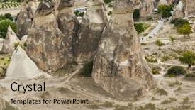  Presentation with fairy tale - Cool new PPT theme with chimney rocks in pasabg monk backdrop and a coral colored foreground